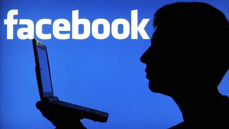(ILLUSTRATION) An illustration dated 23 January 2012 shows the silhouette of a man in front of a screen with the logo of the online network Facebook in Hanover, Germany. Facebook is being criticized again and again for data privacy. Most recently, Facebook has introduced the Timeline, with which Facebook users can share moments of the entire life with other internet users online. Photo: Julian Stratenschulte -ALLIANCE-INFOPHOTO