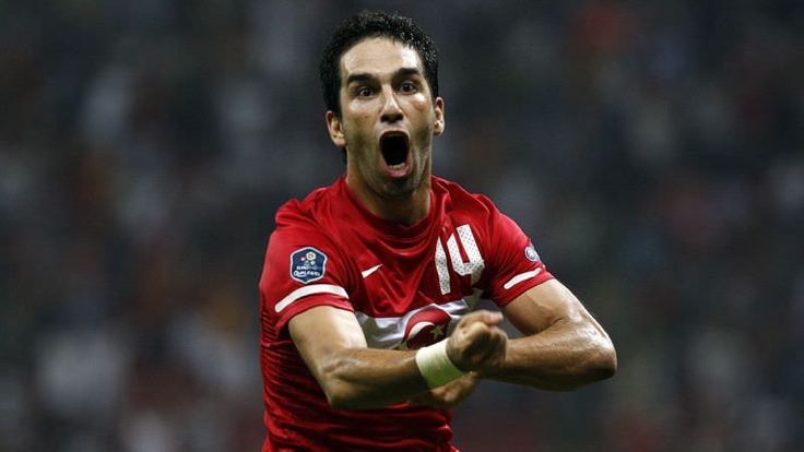 Turkey's Arda Turan celebrates after scoring Kazakhstan during their Euro 2012 Group A qualifying soccer match